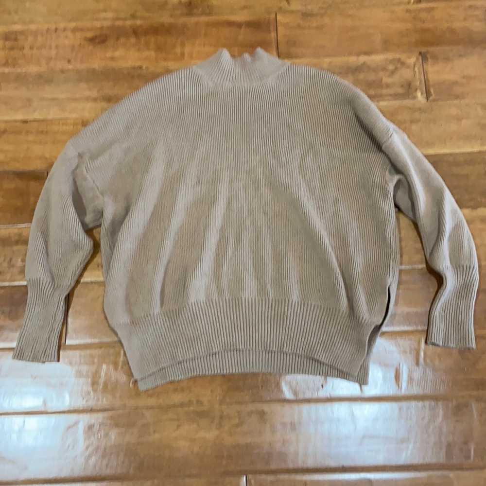 light brown turtleneck sweater